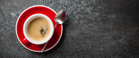 Cup of coffee on black backgroundの写真素材