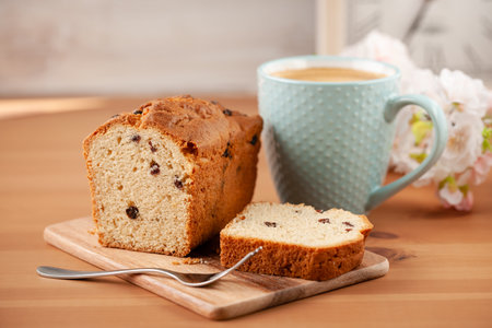Fresh cake with cup of coffee on a tableの写真素材