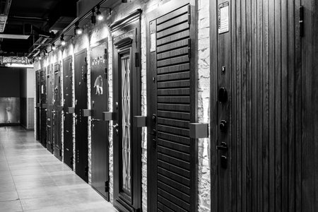 Row of doors for sale. Black and white photo.