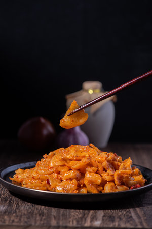 stir-fried macaroni with tomato sauce on wooden backgroundの写真素材