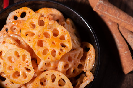 Dried lotus root in a bowl (close-up shot)の写真素材