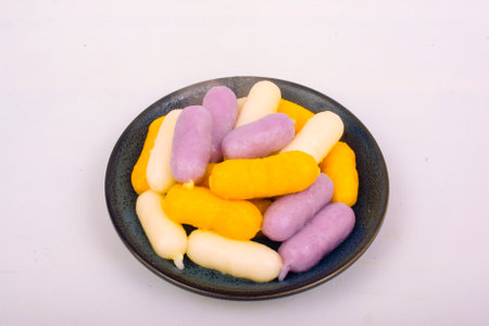 Colorful Thai dessert in a ceramic plate on white background, Thailand.の写真素材