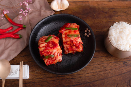 Korean food Kimchi, Kimchi with rice on wooden backgroundの写真素材