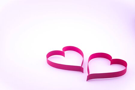 Valentine's day., Ribbon red heart on pink background., Concept give a love.の写真素材
