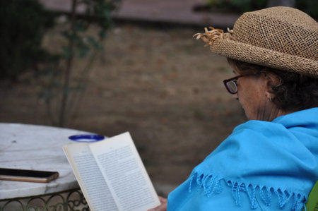 my mom is reading a bookの写真素材