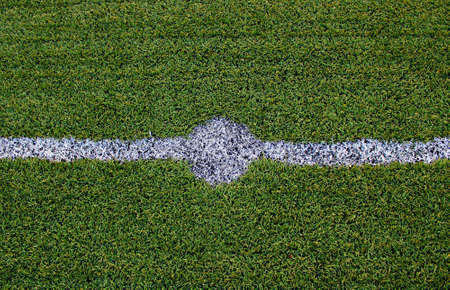 Green sports field with artificial grass の写真素材