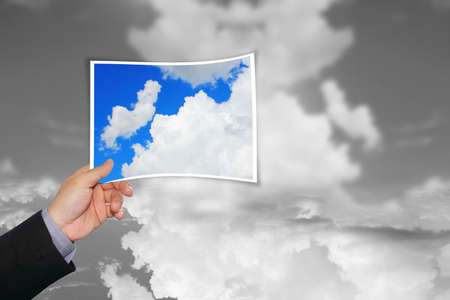 Clouds rising up from a pictureの写真素材