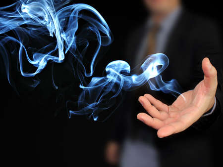 hand holding smoke background Abstractの写真素材