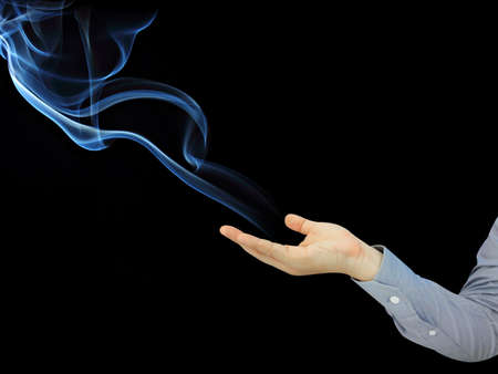 hand holding smoke background Abstractの写真素材