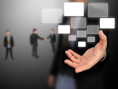 Businessman holding touchscreen 