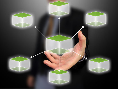Business hand holding cubic diagram