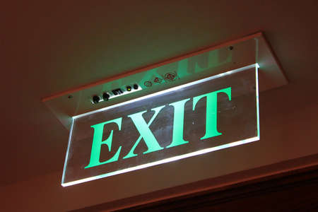 Neon Green Exit Signの写真素材