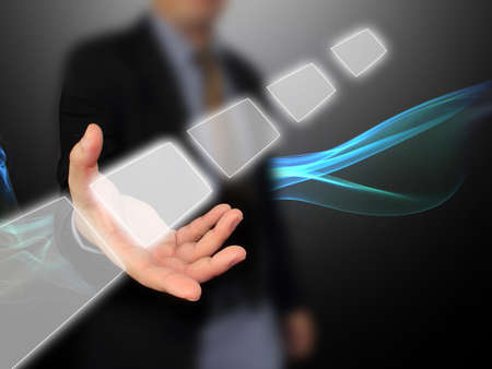 Businessman holding touchscreen の写真素材