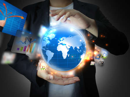 businessman holding business worldの写真素材