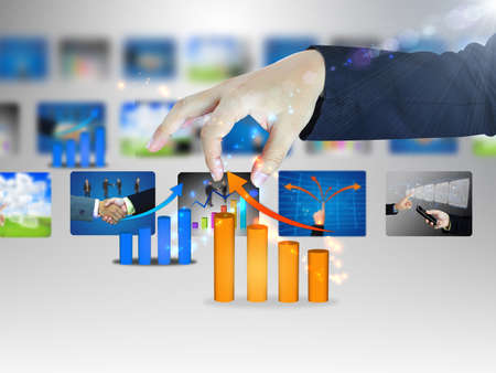 businessman holding graphの写真素材