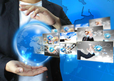 Businessman holding world .Technology concept の写真素材