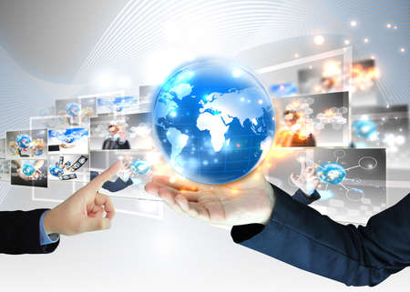 Businessman holding world .Technology concept の写真素材
