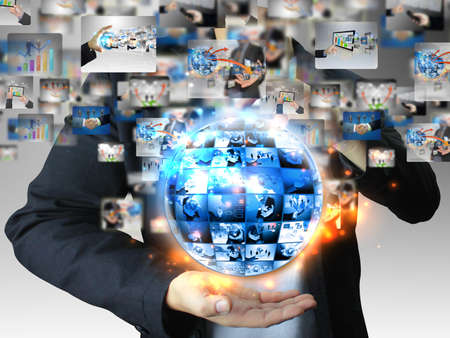 businessman holding business world の写真素材