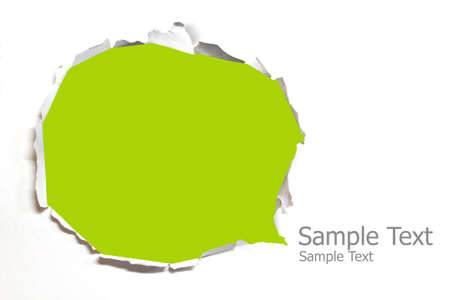 Torn paper with green backgroundの写真素材