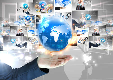Businessman holding world .Technology concept の写真素材