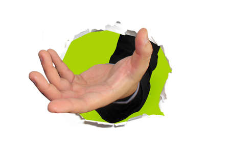 Torn paper with handの写真素材