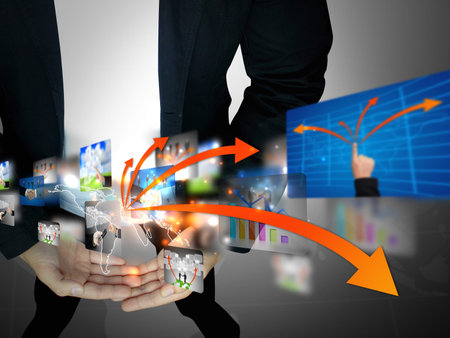 Businessman holding business world 
