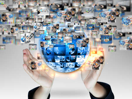 businessman holding business world の写真素材