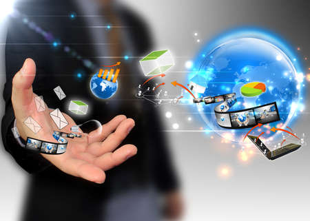 businessman holding ideas around the world social mediaの写真素材