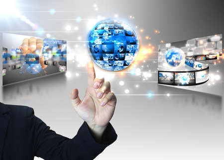 Businessman pushing business worldの写真素材