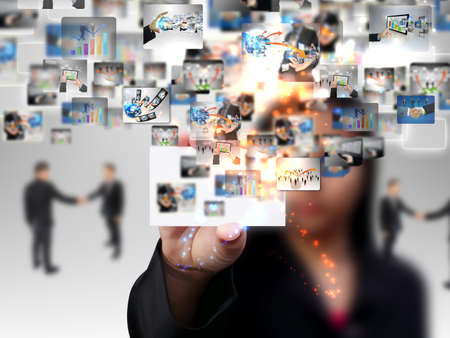 Businesswoman holding a business card の写真素材