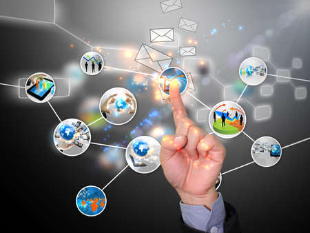 Businessman pressing business world の写真素材