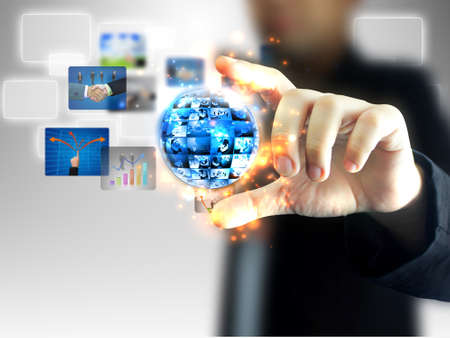 businessman holding business world の写真素材