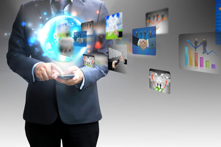 businessman holding business world 