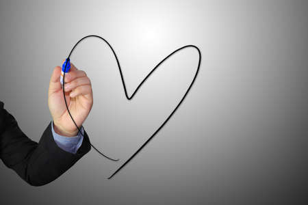 hand draws a heart signの写真素材