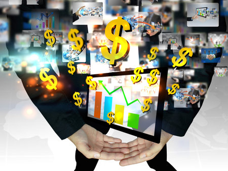 Businessman holding business graph