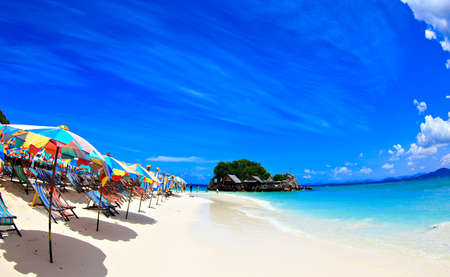 Beach chairs with umbrella and beautiful beach.Khai Island Phuketの写真素材