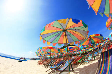 Beach chairs with umbrella and beautiful beach.Khai Island Phuket の写真素材