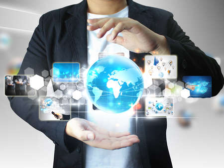 businessman holding business world の写真素材