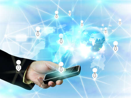 Businessman holding social network の写真素材