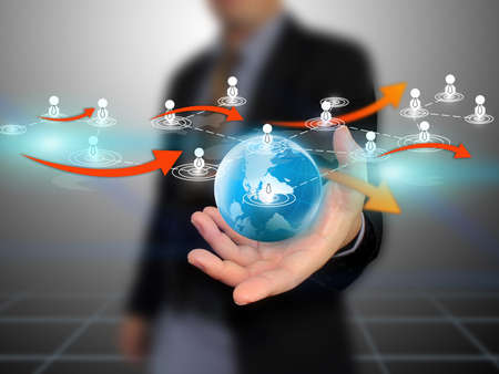 Businessman holding social network の写真素材