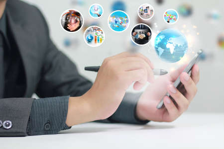 Businessman using a smart phoneの写真素材