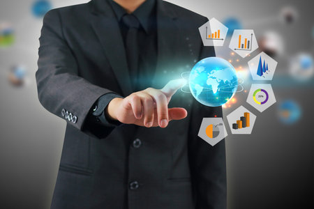 Businessman pressing business graph
