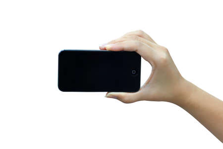 female hands holding smartphone   Isolated on background white のeditorial素材