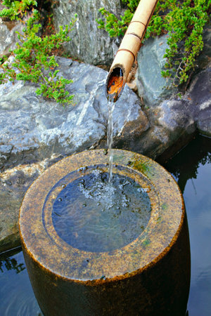 Japanese home garden bamboo waterfall pond