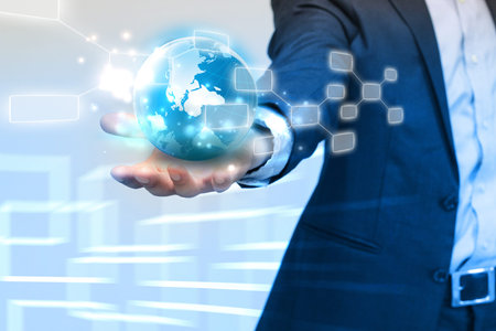 businessman holding globe, connected.