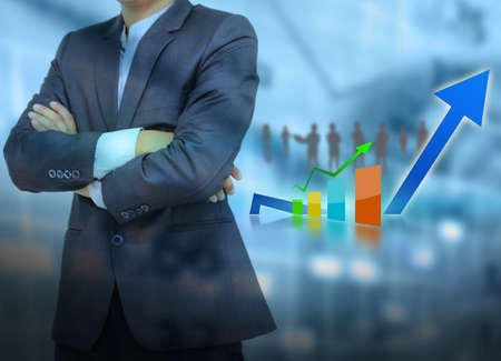 Businessman with successful graph. の写真素材