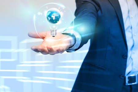 Light bulb in hand.idea concept.の写真素材