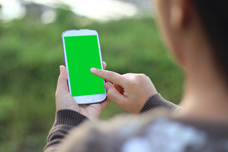 woman hands holding smartphone.