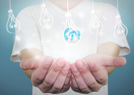 businessman holding globeの写真素材