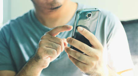 Businessman touching screen on digital tablet.の写真素材